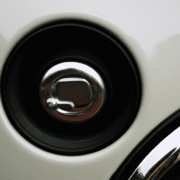 How do you remove the gas cap on a Mini Cooper?